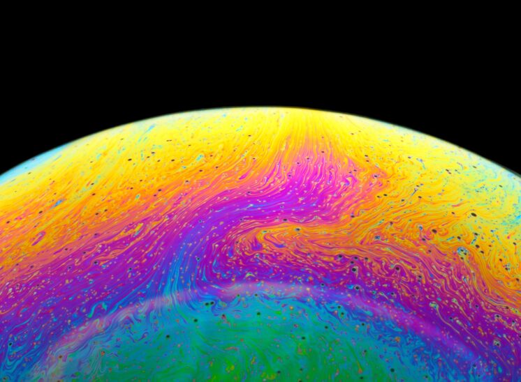 Close-up of multicoloured bubble surface