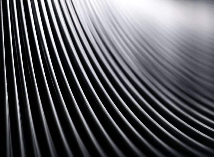 Black and white, high contrast, close up abstract of toy Slinky spring